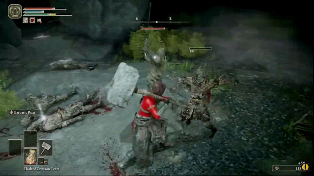 A player with a hammer fighting 2 undead soldiers wielding short swords.