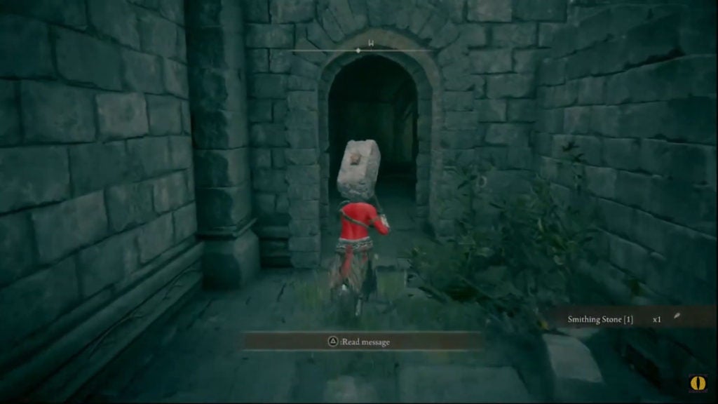The player running inside the castle through a dark doorway.