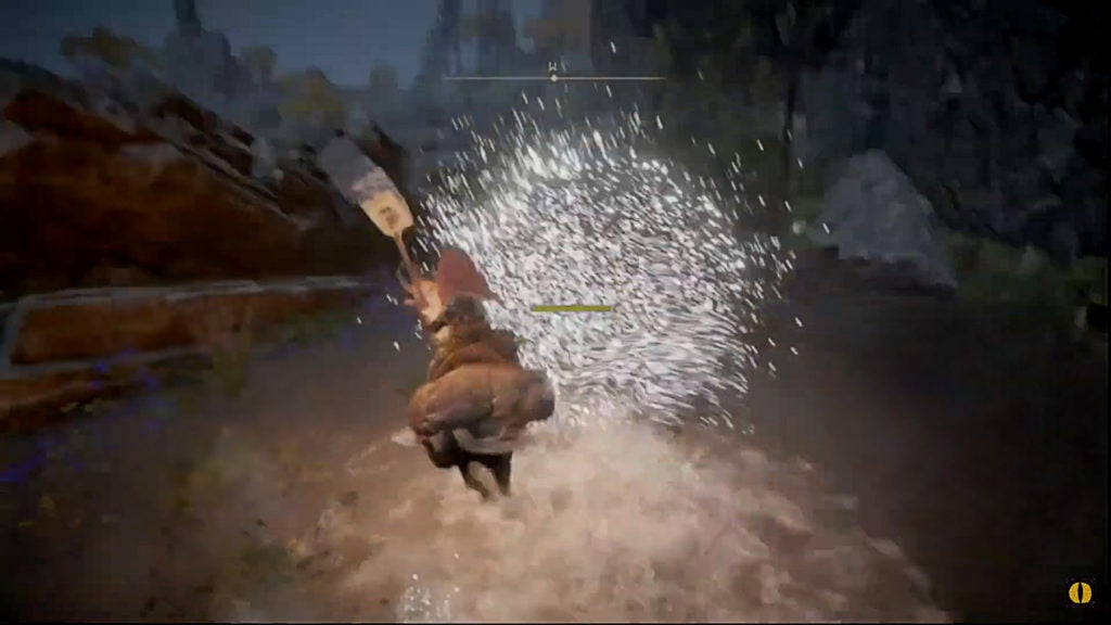 A player on horseback with a hammer hitting a large ball and exploding it into white sparks.
