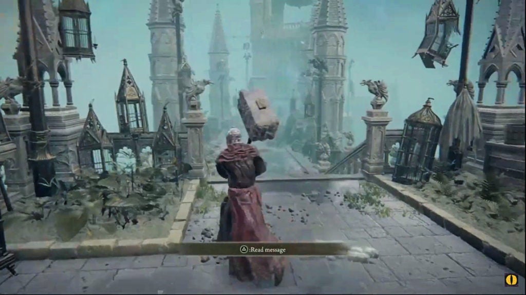The player looking down a curving path with many ornate stone statues.