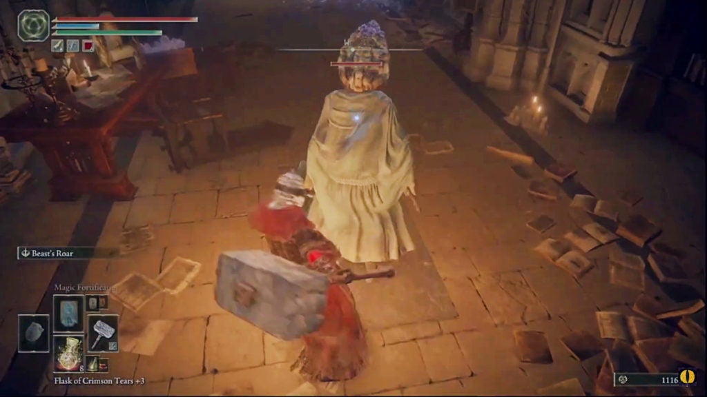 The player attacking an enemy in white robes from behind.