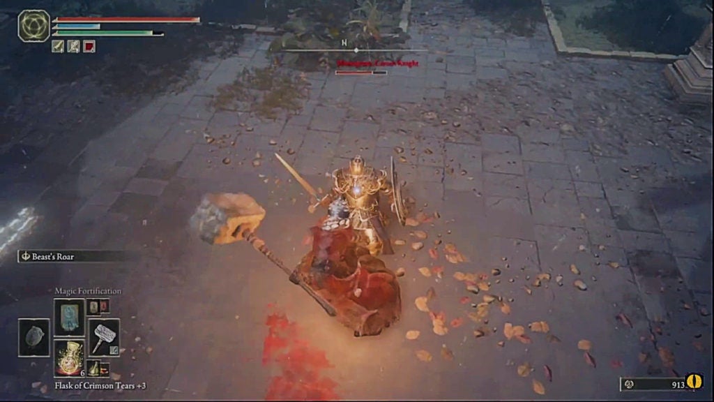 The player about to hit a kneeling knight in the chest with a hammer.