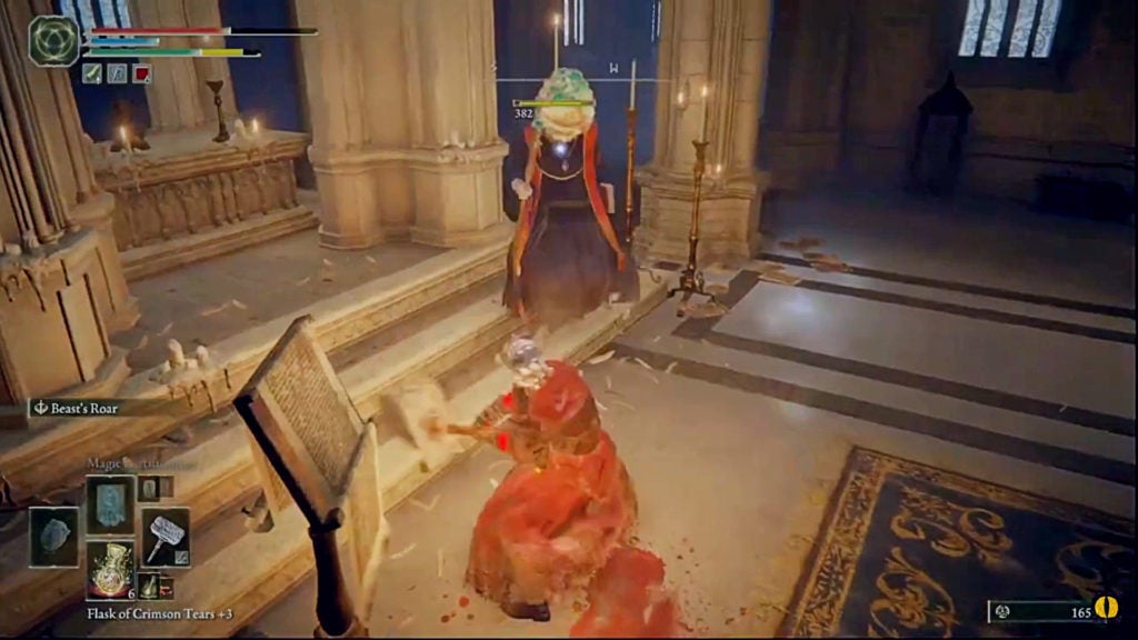 The player hitting a sorcerer in the head with a hammer.
