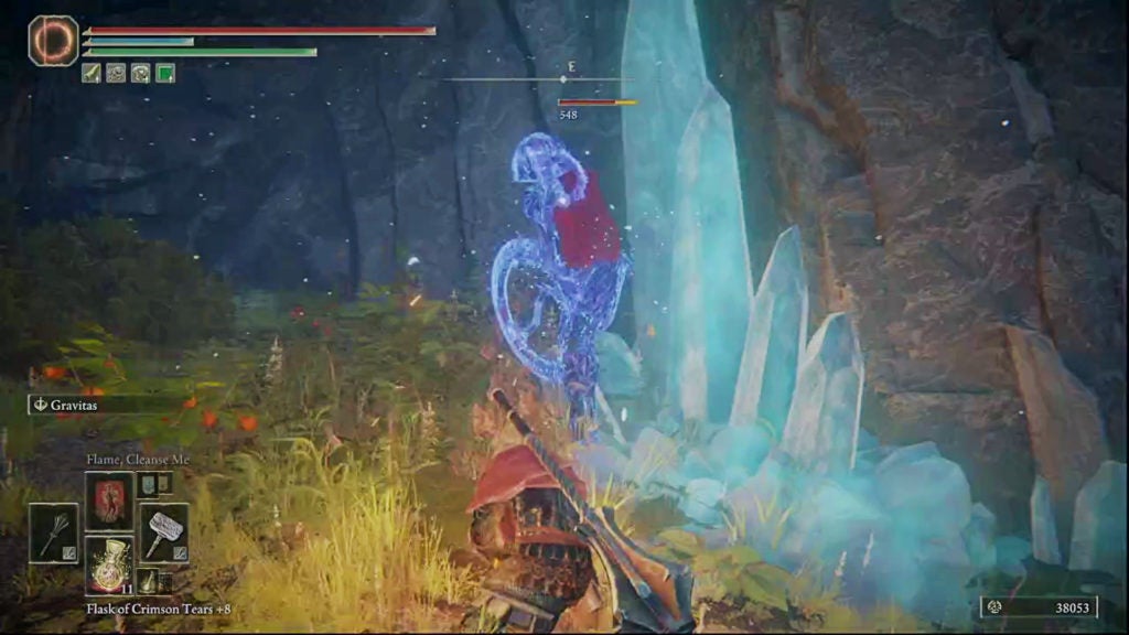 The player hitting a crystalian with a hammer and doing 548 damage.