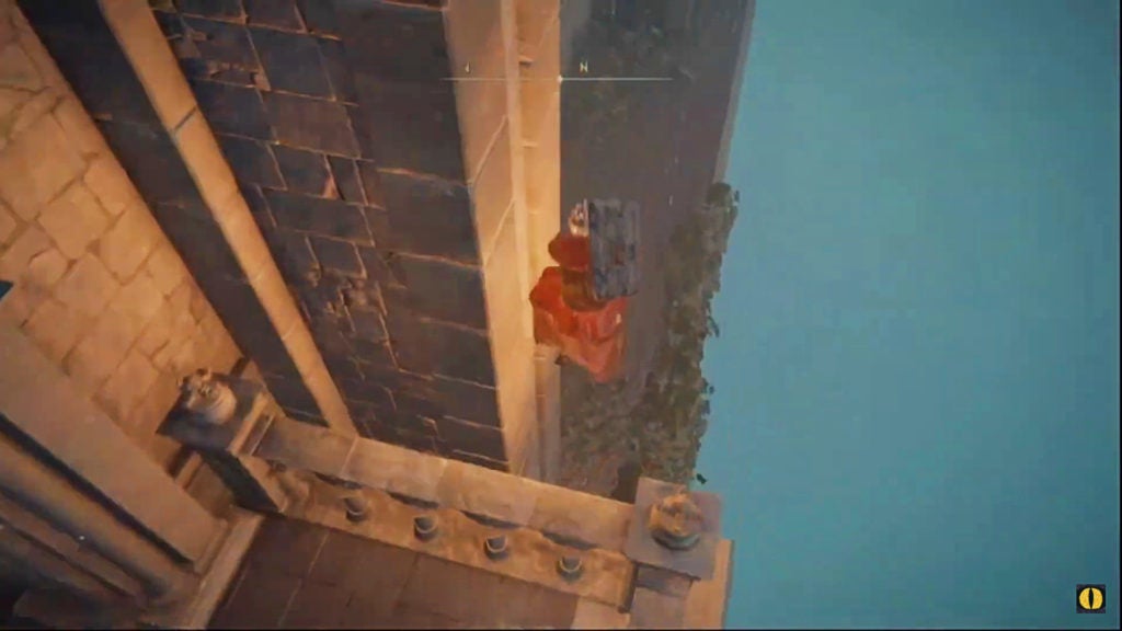The player leaping off of a balcony to a path below.