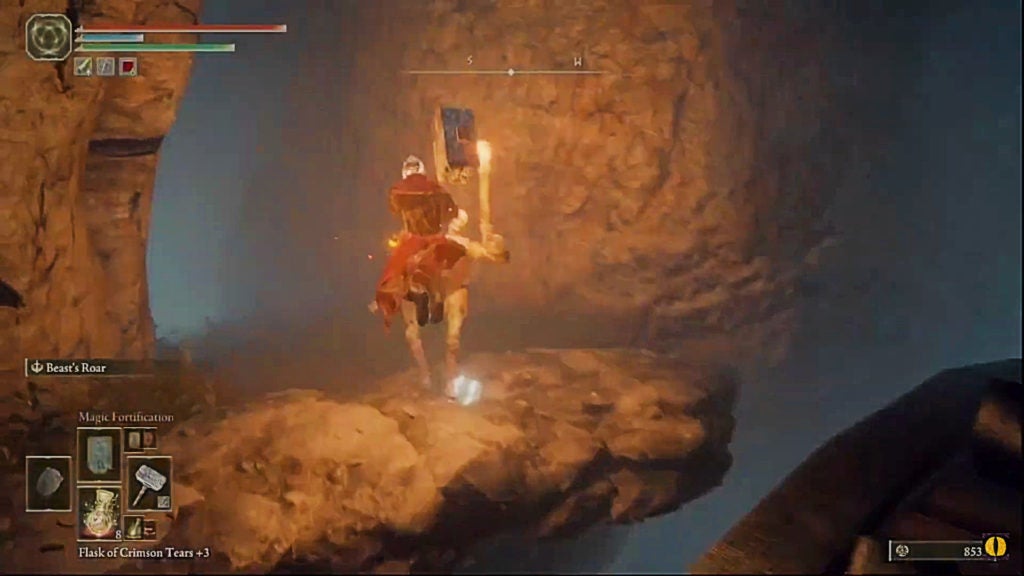 The player jumping to a ledge with an aristocrat zombie holding a torch.