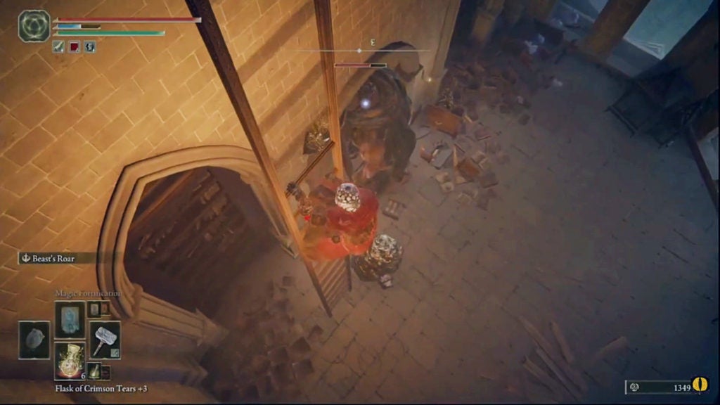 The player on a ladder looking down at a pumpkinhead in the room below.
