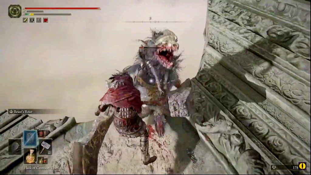 The player hitting a kneeling beastman in the stomach with a hammer.