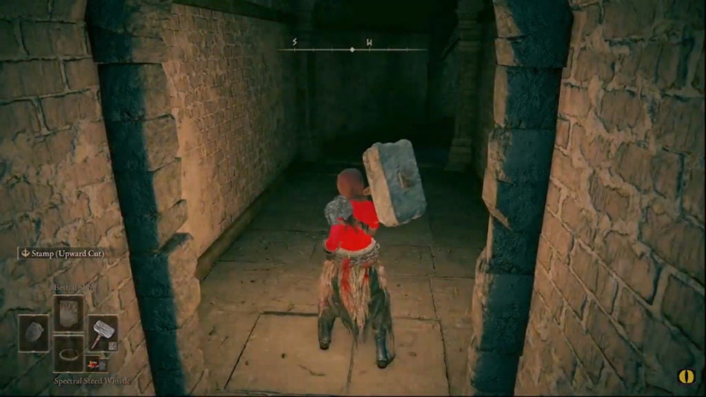 The player turning on a lantern on their hip to illuminate the dark corridor they are in.