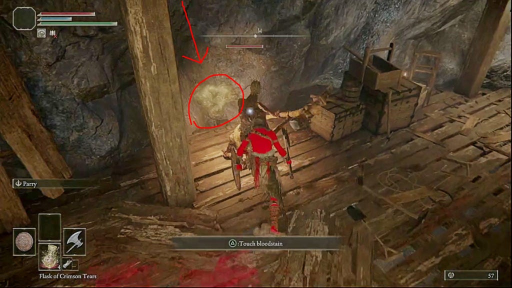 A miner digging out a smithing stone from the cave wall while the player sneaks up behind them. The smithing stone has a red circle and a red arrow pointing at it.