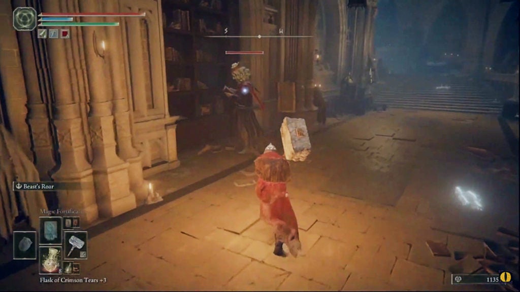The player sneaking up on a sorcerer who is reading a book.