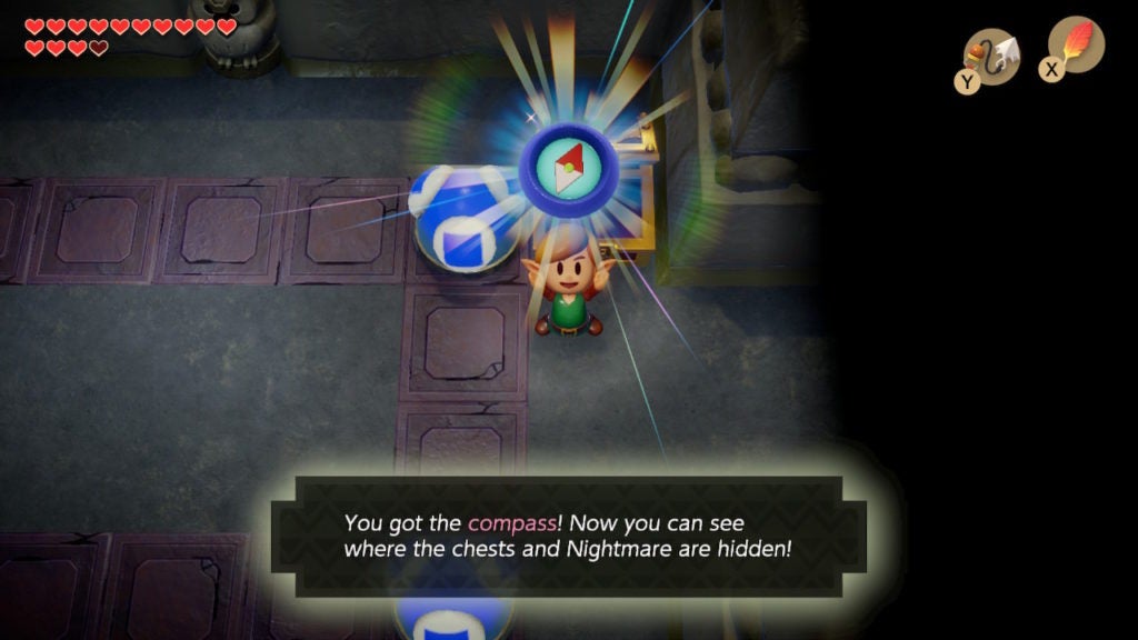 Link picking up the Compass in Color Dungeon.