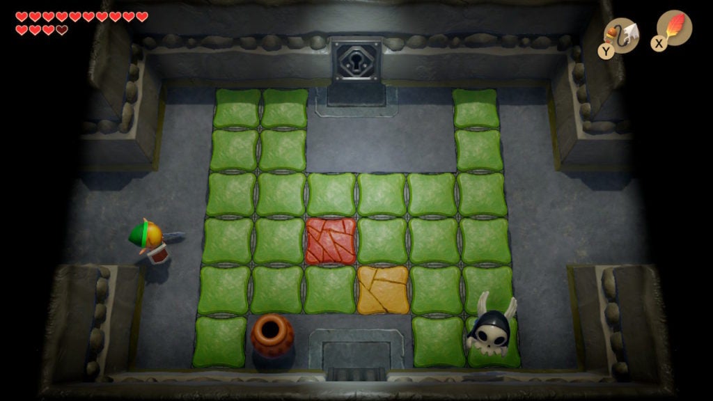 Link in a room with many green breakable floor tiles.