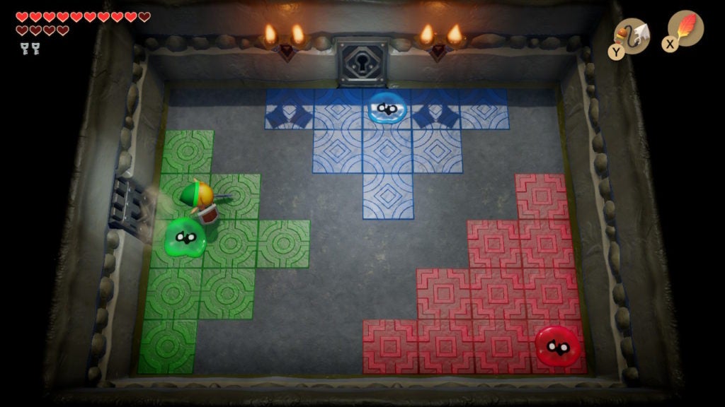Link in a room with 3 goo specters; 1 green, 1 blue, and 1 red.
