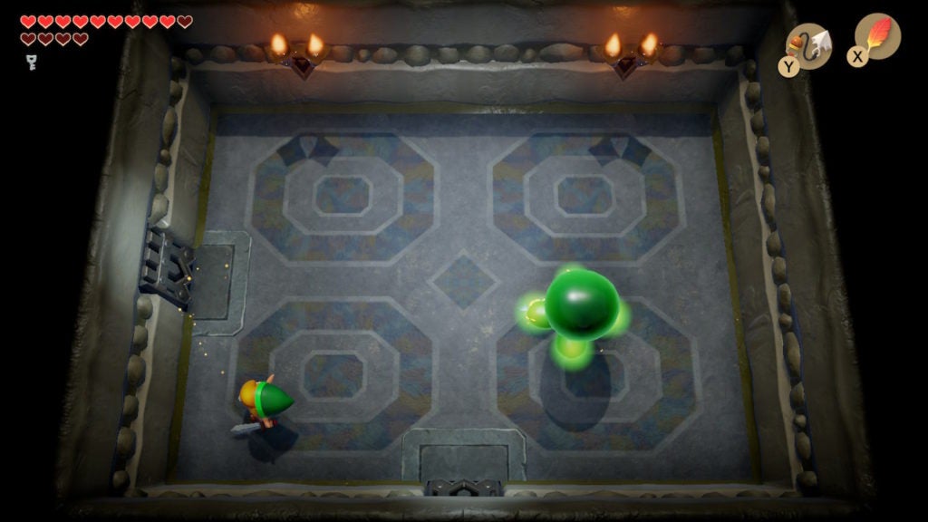 Link fighting a giant green blob.