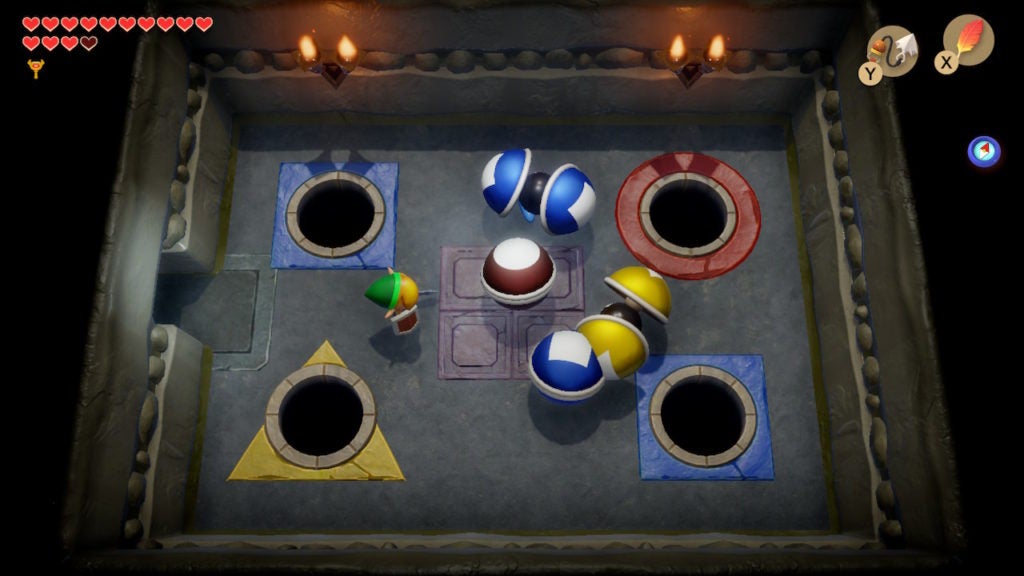 Link in a room with 4 Orb Monsters. 2 are blue, 1 is red, and the last 1 is yellow.