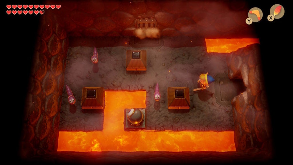 Link entering a room with 1 eye-like Beamos and 3 small pink worm-like enemies.