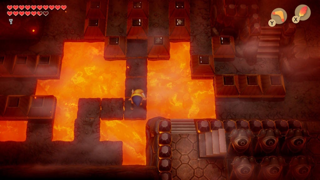 Link walking on a path over lava that he just made with a floor-maker machine.
