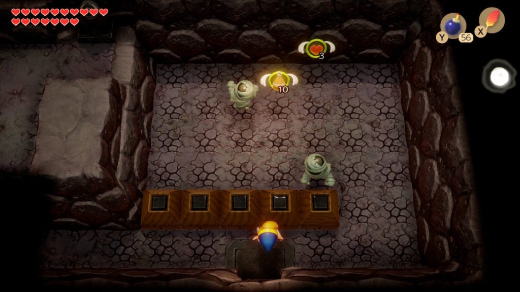 Link in a room with 2 mummy-like enemies.