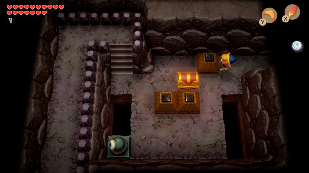 Link pushing blocks around a chest.