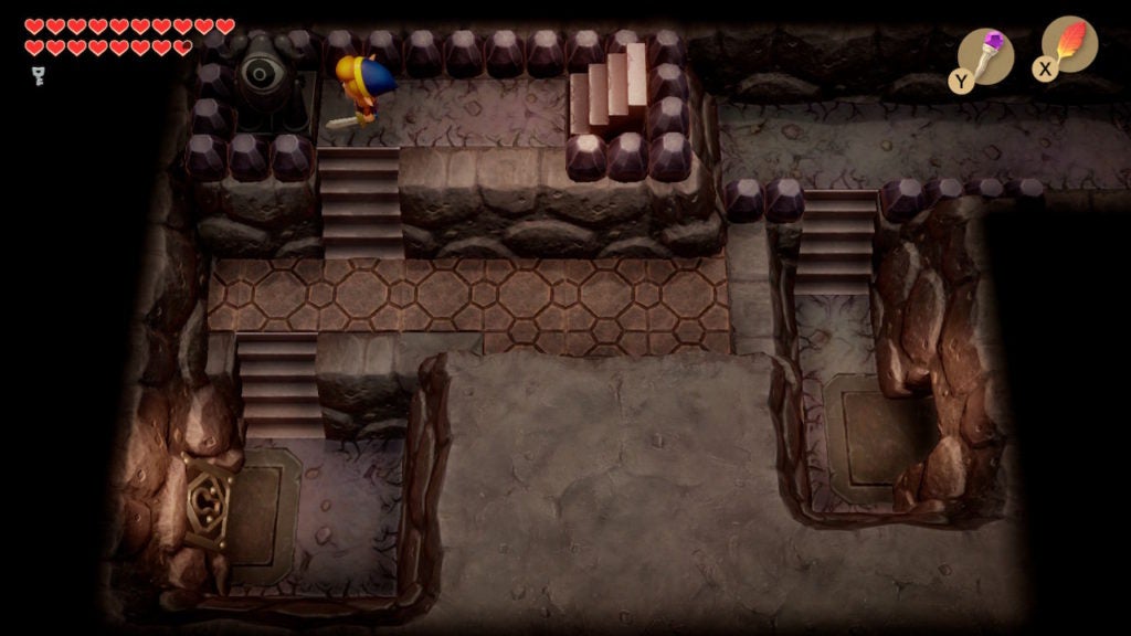 Link on the western side of a partitioned room with many stairs.