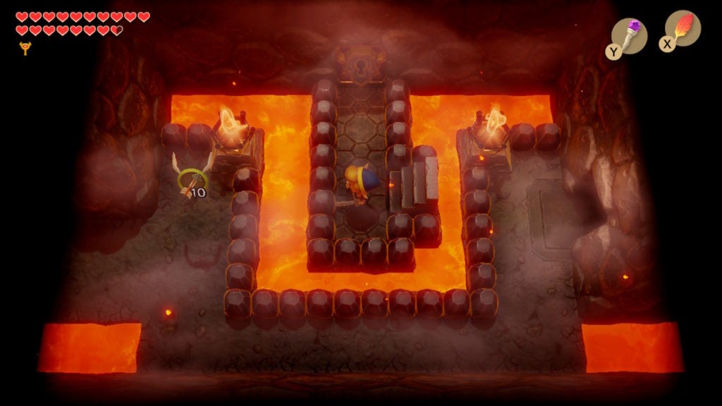Link standing in front of the Nightmare door on a strip of land surrounded by lava.