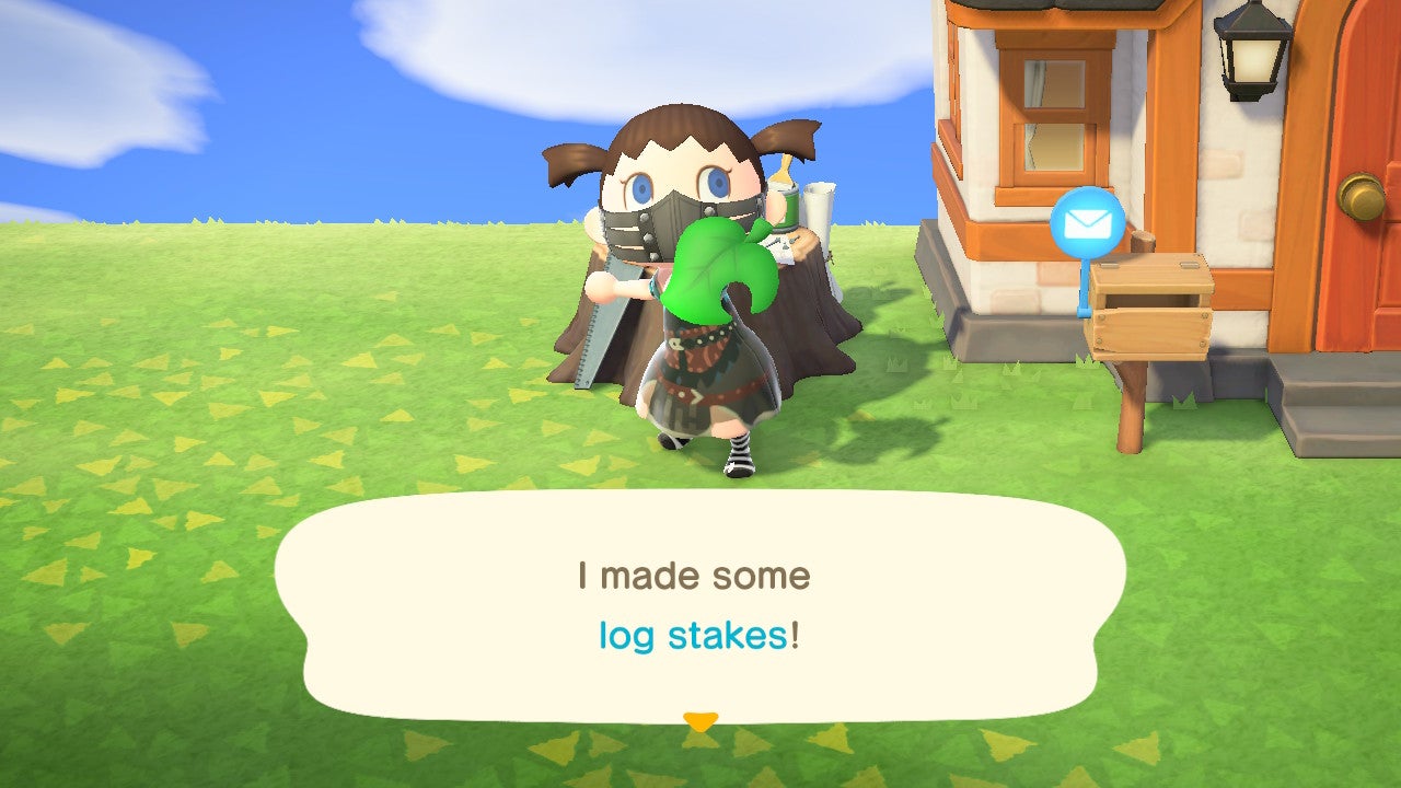 Character holding up crafted Log Stakes.