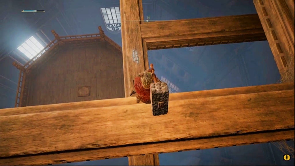 Player looking down past some wooden beams at a elevator platform below.