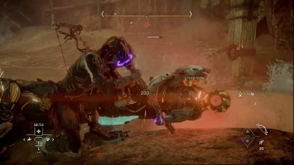 Aloy performing a critical strike on a downed Tracker Burrower.