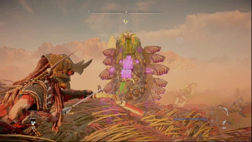 Aloy aiming at a Slitherfang's earthgrinder components with a bow from cover. The earthgrinders are tagged and are highlighted in pink.