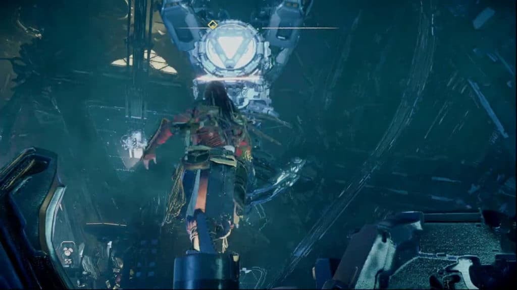 Aloy jumping onto the back of a metal carrier.
