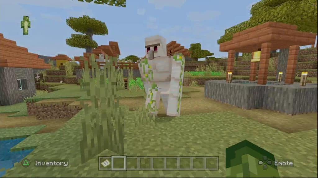 An Iron Golem peacefully walking around in a Village.