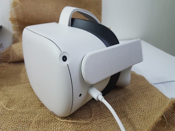 Oculus Quest 2 headset plugged in to charge