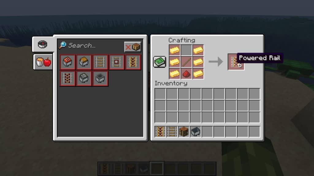 A player using a crafting table to see what's needed to make Powered Rails. The required items to make 6 Powered Rails are 6 Gold Ingots, 1 Redstone Dust, and 1 Stick.