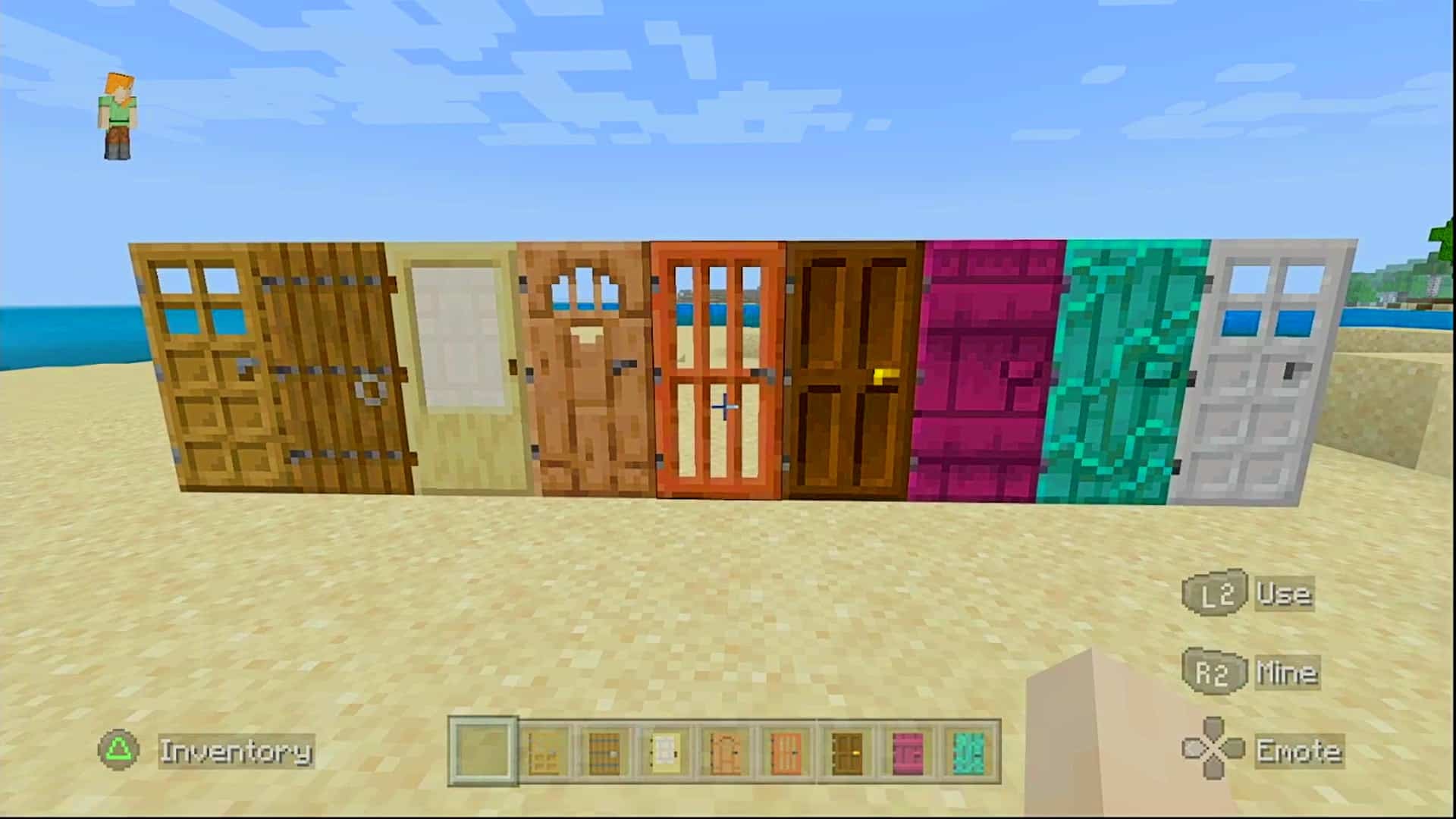 Every kind of door lined up on a beach.