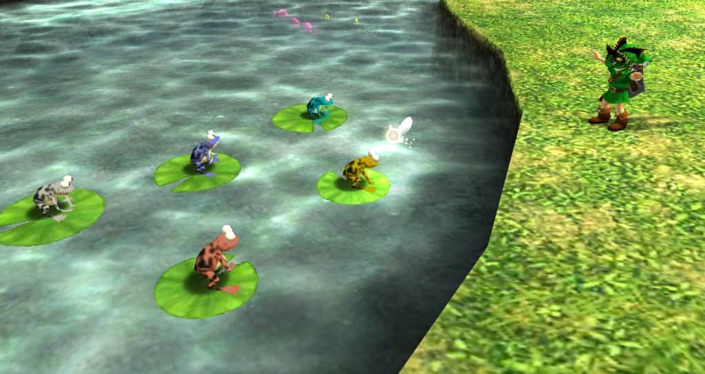 Link wearing the Don Gero Mask and facing 5 differently colored frogs in a pond.
