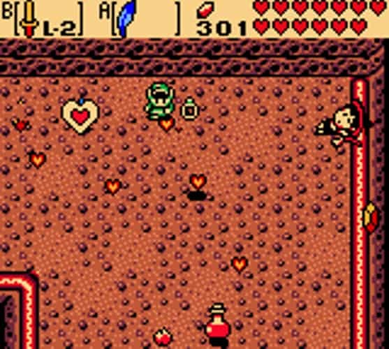 Link standing near a defeated Maple the Witch and a Heart Piece. There are many hearts lying around, indicating that many enemies have been defeated.