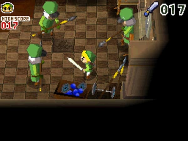 Link fighting 3 guards at once, who are surrounding him and are wearing green.
