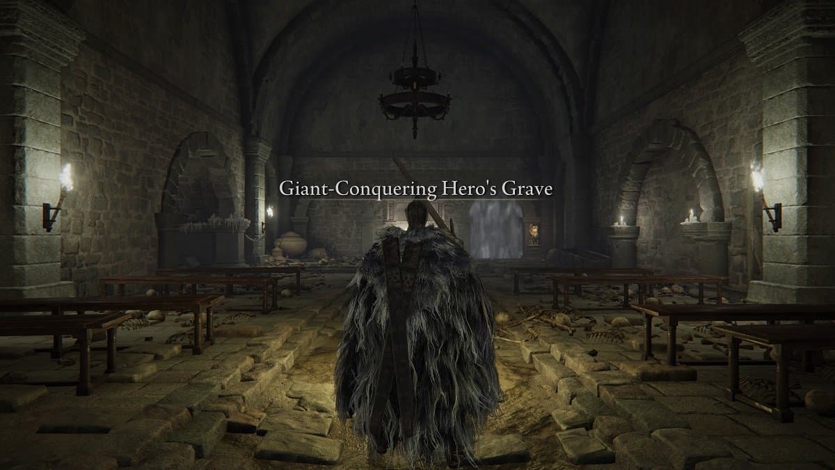 The Tarnished in the Giant Conquering Hero's Grave in Elden Ring.