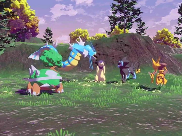 5 Pokémon in a grassy area. From left to right: Torterra, Gyarados, Hisuian Typhlosion, Luxray, and Alakazam.