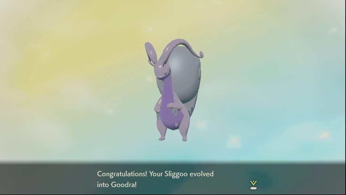 Hisuian Goodra standing in front of a yellow and blue background with congratulatory text underneath them.