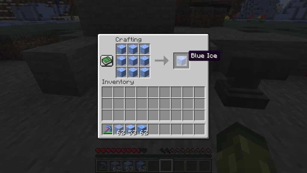 A player combining 9 blocks of packed ice on a crating table to make 1 block of blue ice.