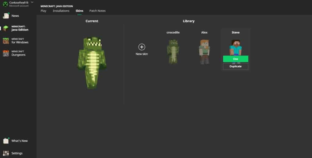 The skins tab in the minecraft launcher showing 3 available skins: the Steve skin, the Alex skin, and a custom skin that looks like a crocodile.