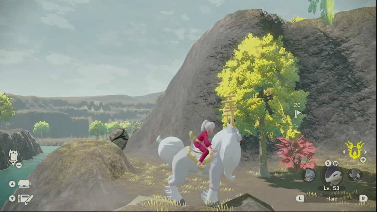 The player riding Wyrdeer while looking at the hill above a cracked rock in the Crimson Mirelands.