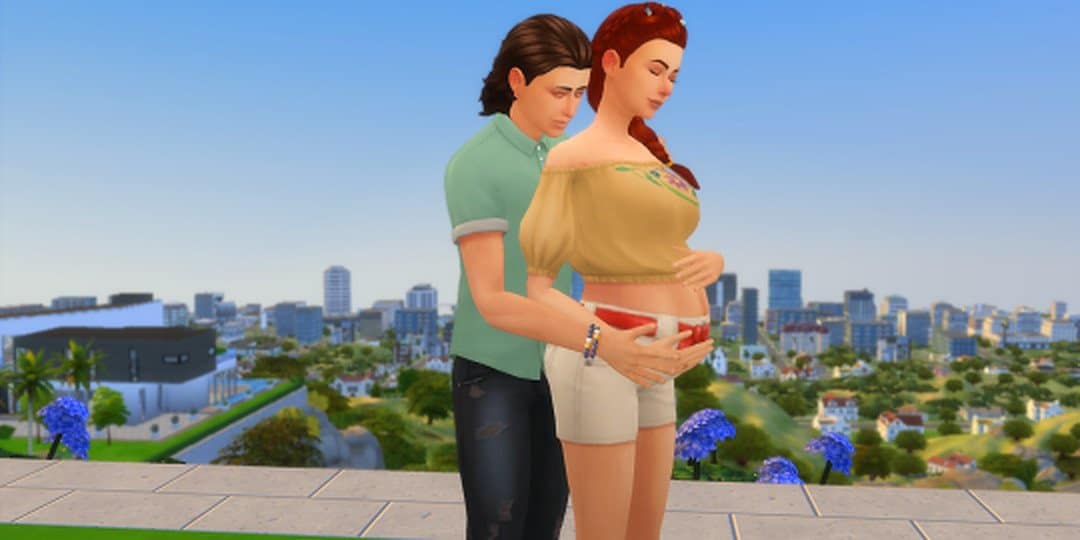 A couple holds a pose in The Sims 4.