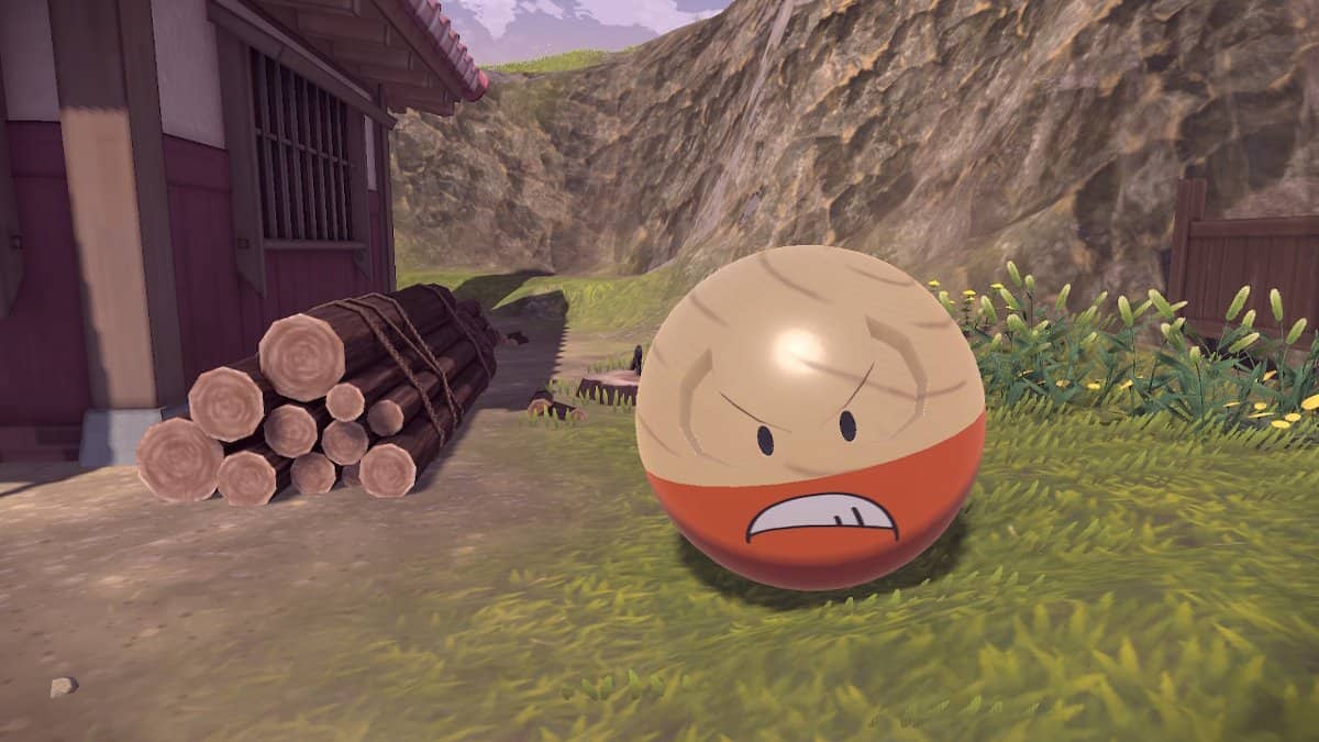 An Electrode hanging out by a pile of logs.