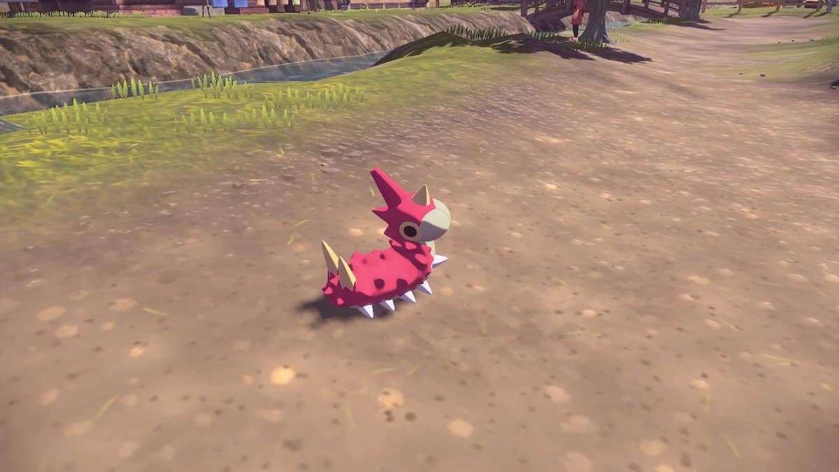 A Wurmple looking at the player while on a dirt path.