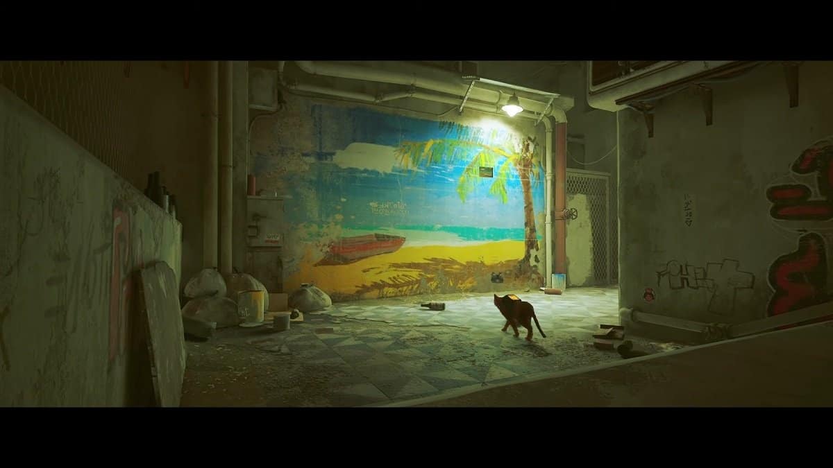 The Stray cat facing a beach mural.