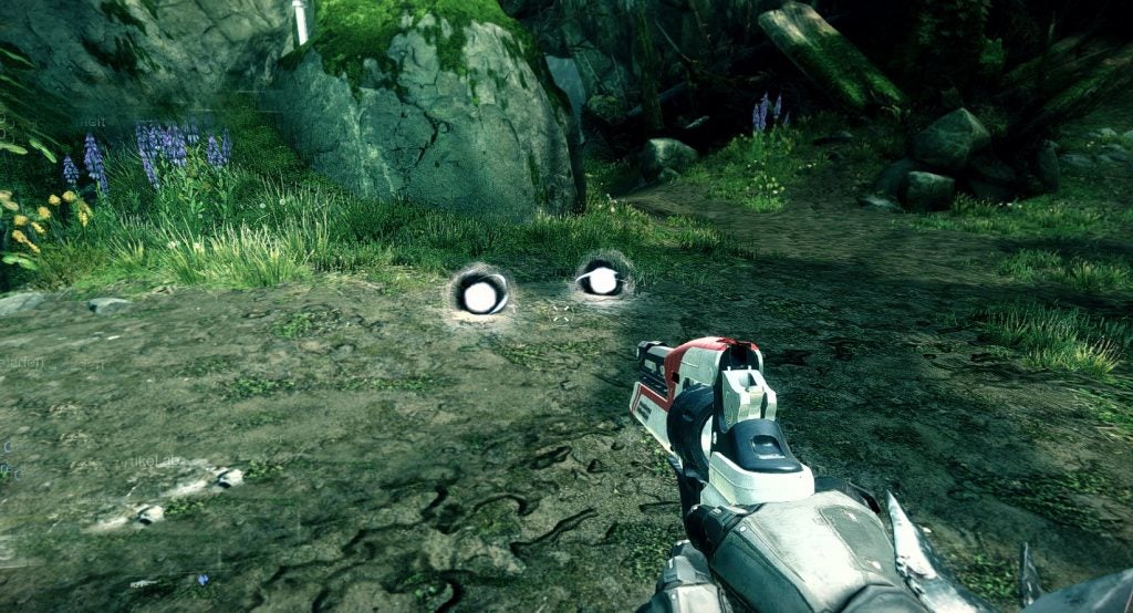 Two glowing white orbs on the ground.