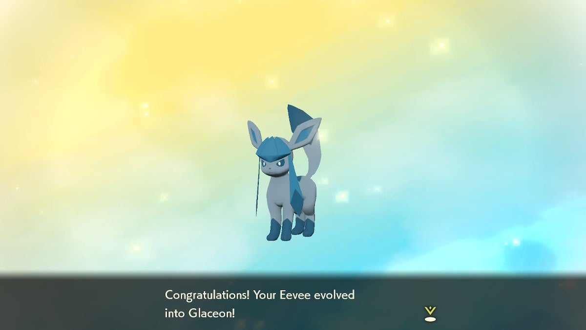 One of the Eevee evolutions. Glaceon is standing in front of a yellow and blue background with congratulatory text underneath them.